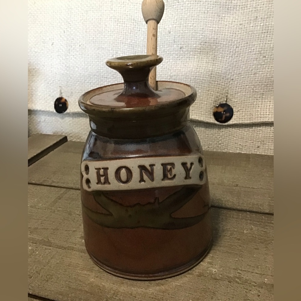 Pottery honey pot with wooden dipper. Made by Whitefish pottery company